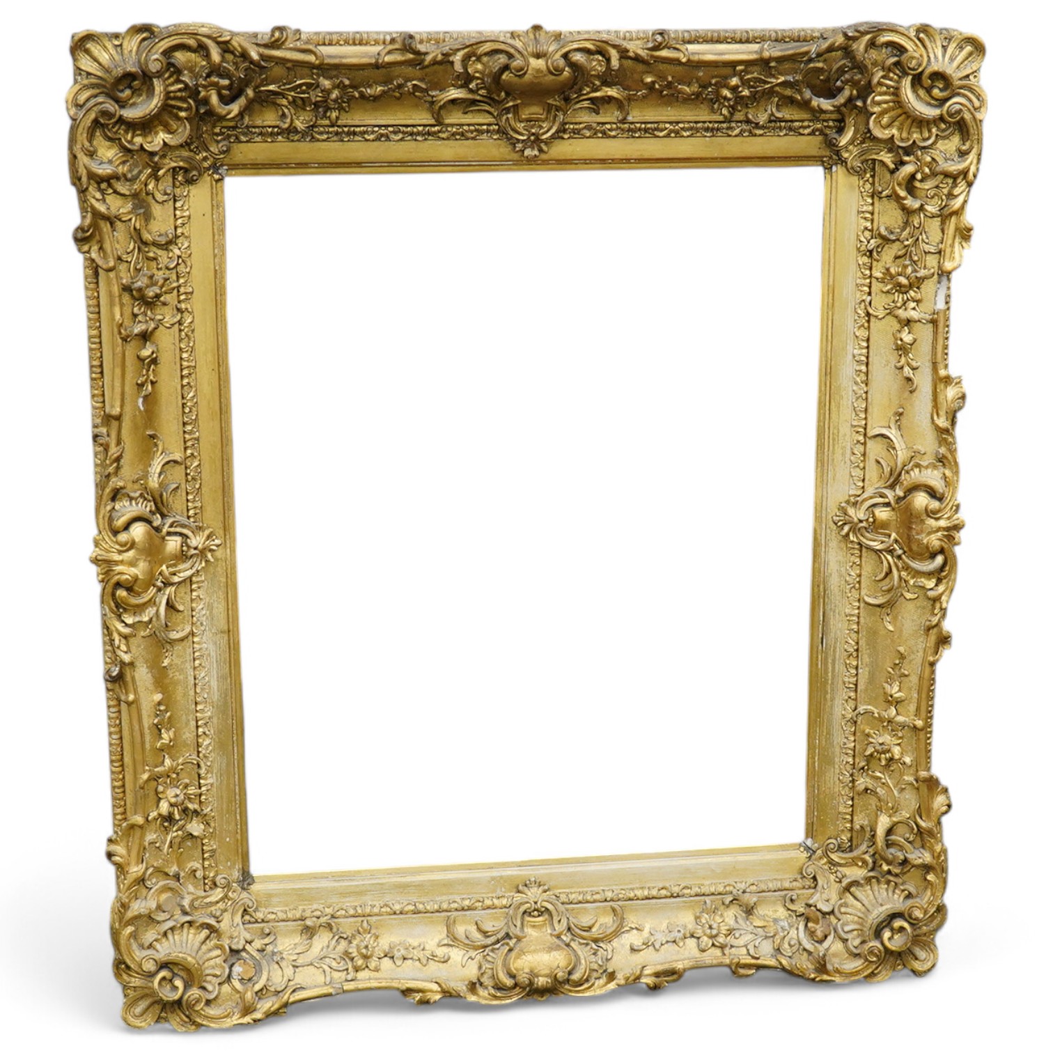 A 19th century ornate gilt picture frame, aperture size 74 x 60cm. Condition - fair, minor losses